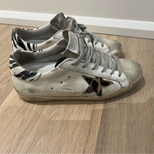 Authentic Golden Goose sneakers size 37. Leopard star and zebra heel accents